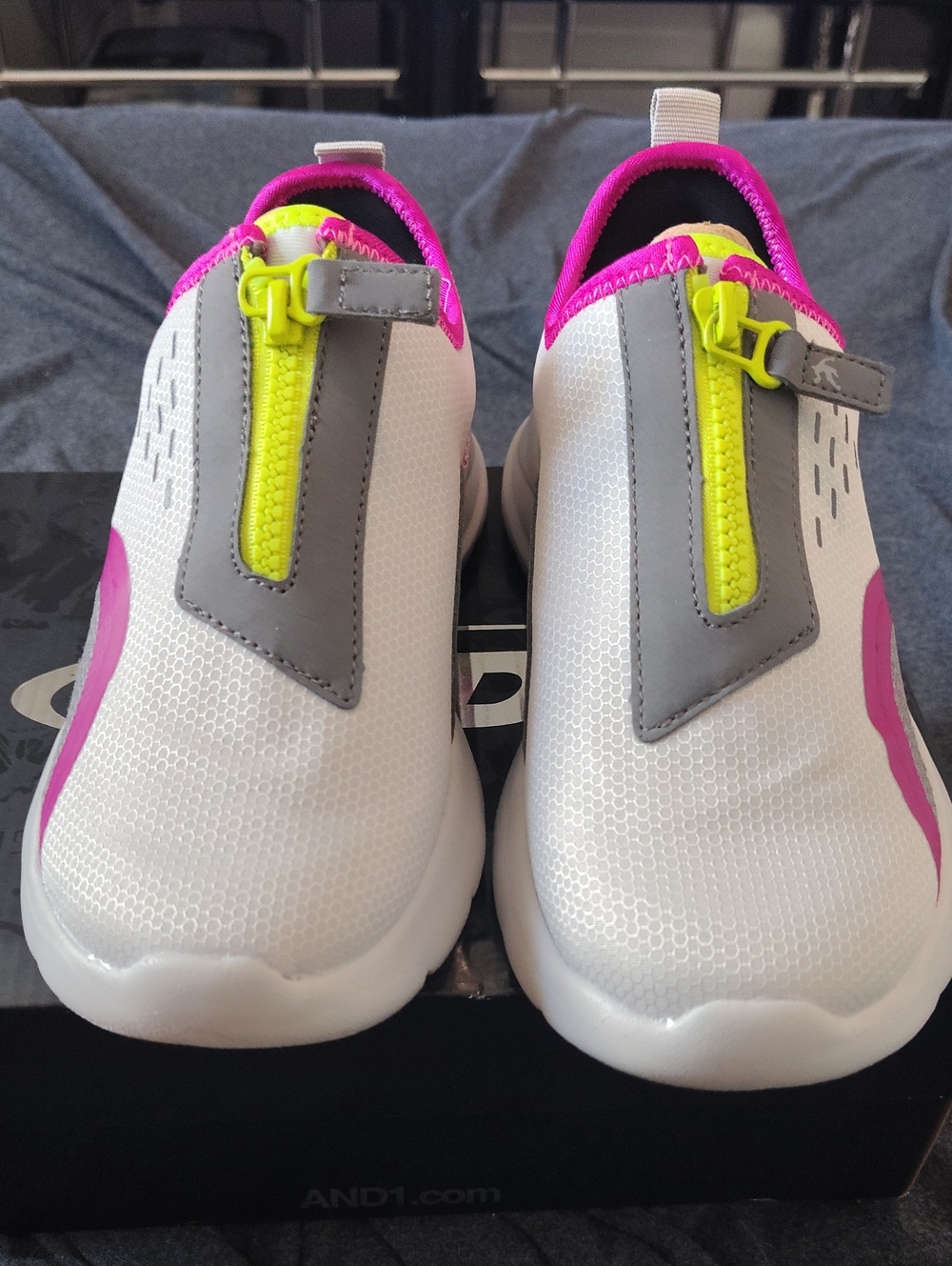 Kids White Slip-On Sneakers with Pink Trim and Neon Yellow Zip